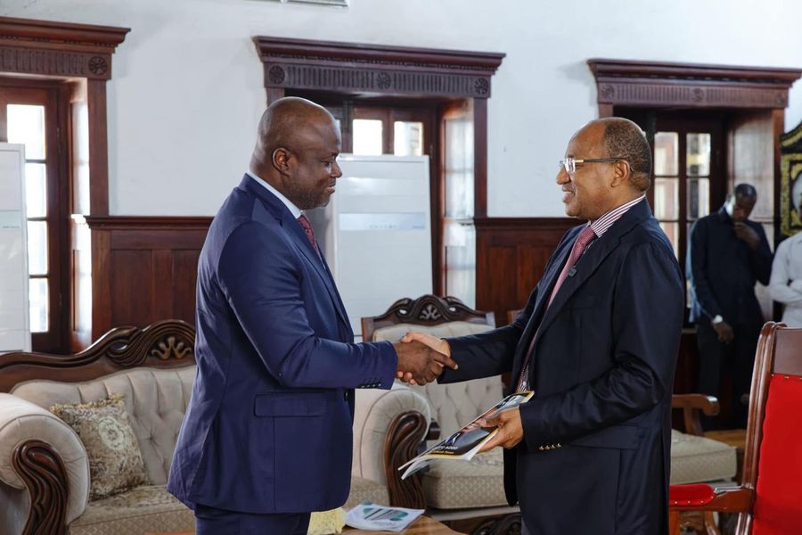 Dr. Ken Giami with H.E. Hussein Ali Mwinyi, President of Zanzibar