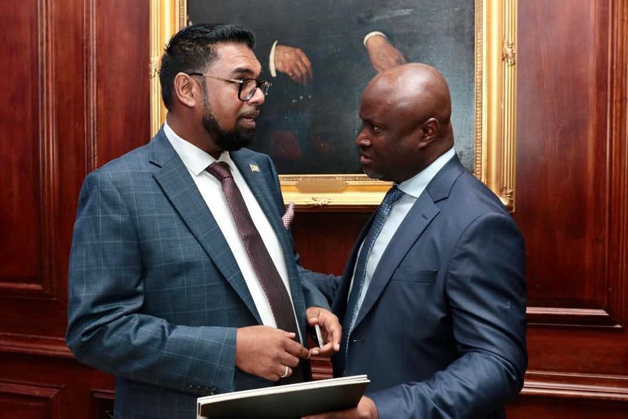 Dr. Ken Giami with H.E. Dr. Mohamed Irfaan Ali, President of Guyana